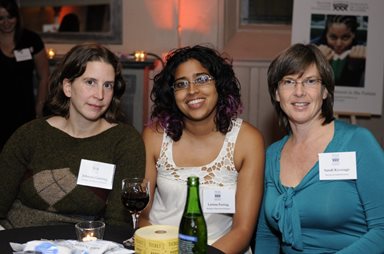 Three women smiling